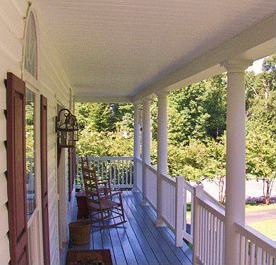 Relax on this large country porch
