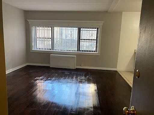 Large Bright Rooms with Hardwood floors.