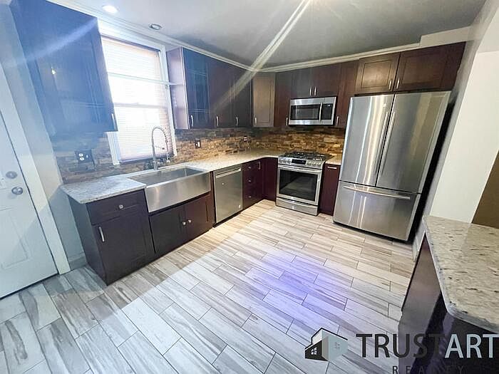 1st image of 115 W Olney Ave
