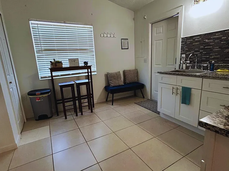 Inviting two-person seating area for coffee or relaxation.