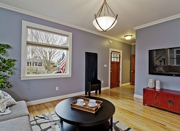 Hardwood floors and crown molding greet you when you walk throug