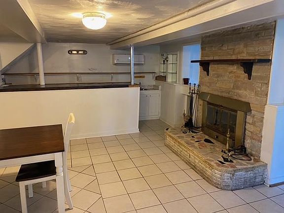 Bar and Fireplace in dining area