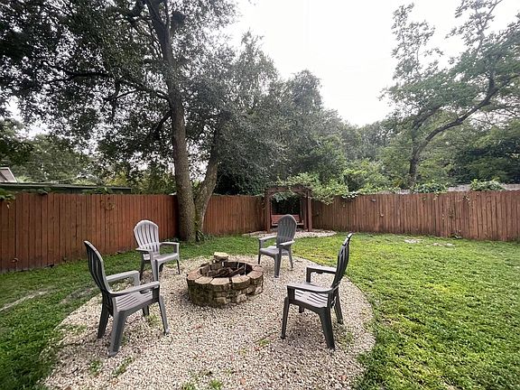 far corner is wood swing to enjoy the nature