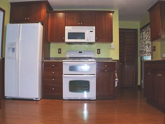 There is a walk in pantry off the kitchen.