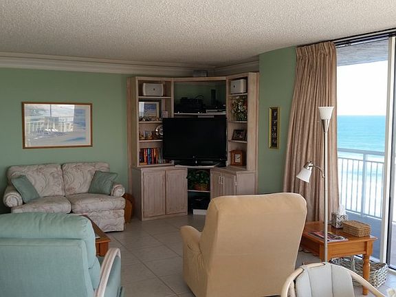 Great room with entertainment center
						:
						Custom built entertainment center. Marine plywood.