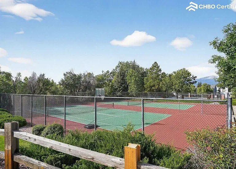 tennis courts, club house and pool on property