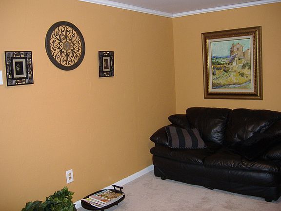 Family room with wood burning stove slides to patio
