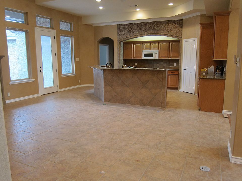 view of living / kitchen / back door