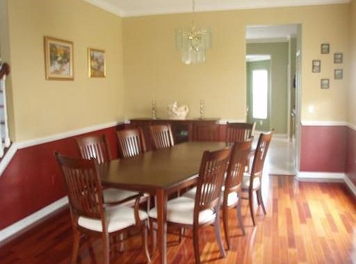 dinning room, rich cherry wood floors designer paint