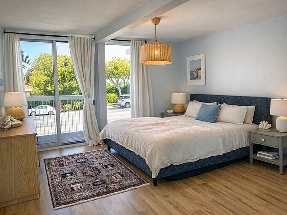 master bedroom with walk in closet