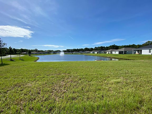 Backyard with lake and fountain view