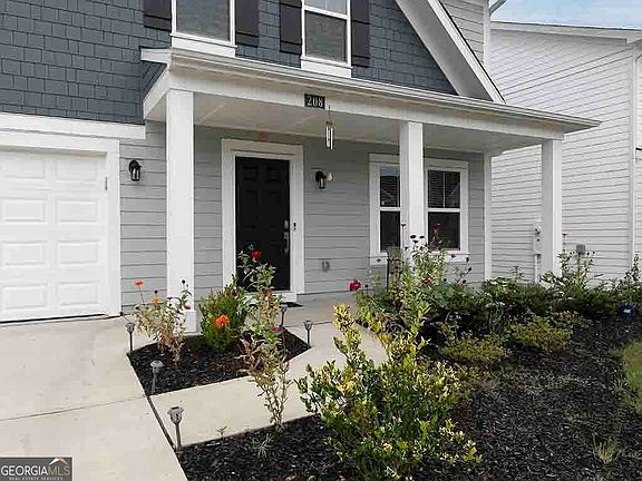 3rd image of 208 Sage Woods Way