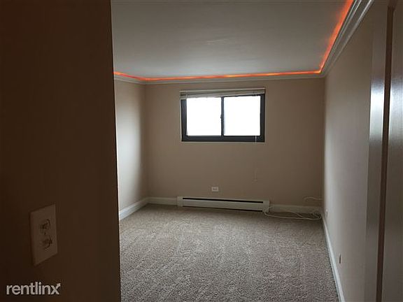Bedroom with Crown Lighting