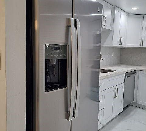 Amazing Brand New Kitchen with Granite - Glass tile backsplash - super highend cabinetry and porcelin floor