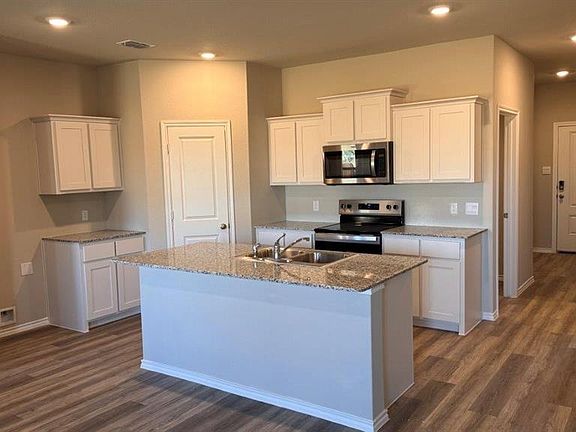 Kitchen - All Home and community information, including pricing, included features, terms, availability and amenities, are subject to change at any time without notice or obligation. All Drawings, pictures, photographs, video, square footages, floor plans, elevations, features, colors and sizes are approximate for illustration purposes only and will vary from the homes as built.
