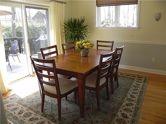 DR w/Pella slider to deck & lush yard