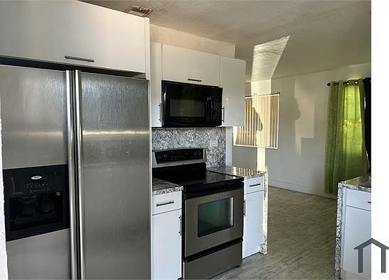 1st image of 9400 NW 32nd Ave