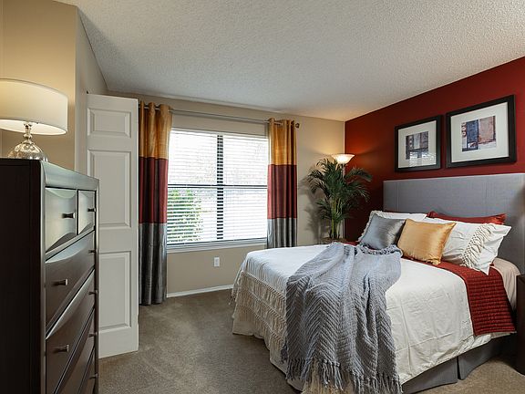 Experience serenity in this well-appointed bedroom, featuring stylish decor and a calming atmosphere.