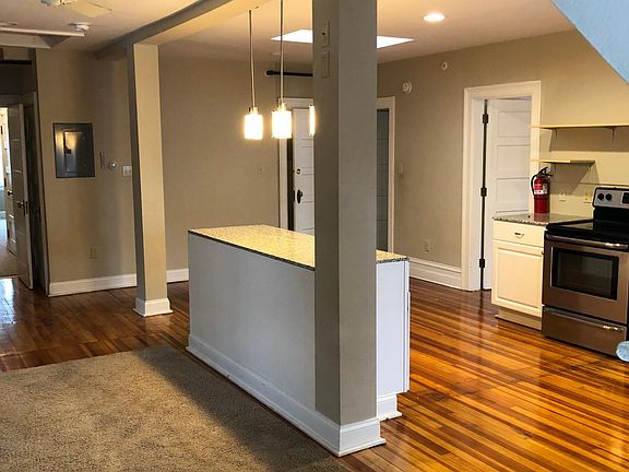 kitchen, dining, and living area