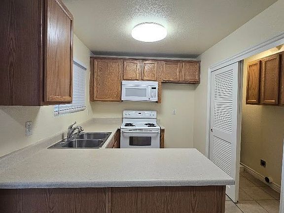 4th image of 1745 N Winery Ave Unit 136