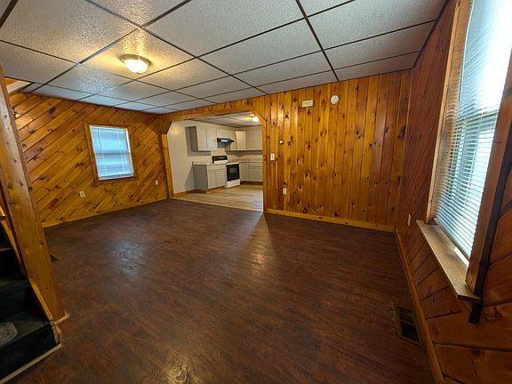 Alternate view of living room with open concept downstairs living