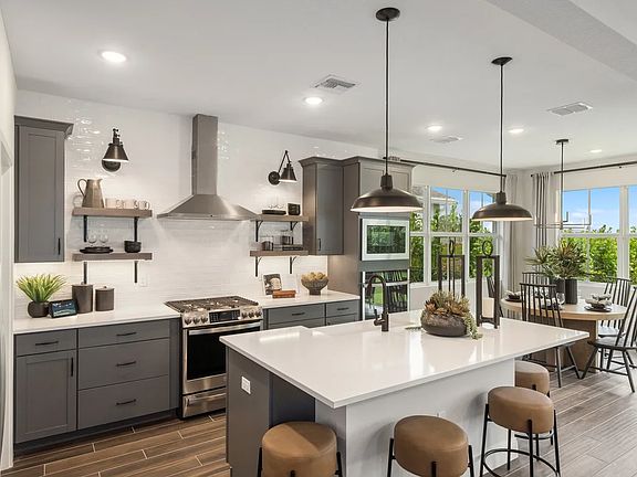 Kitchen with center island and pendant lighting