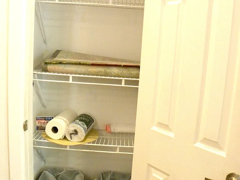 Kitchen Closet with Trash Receptacles & Storage