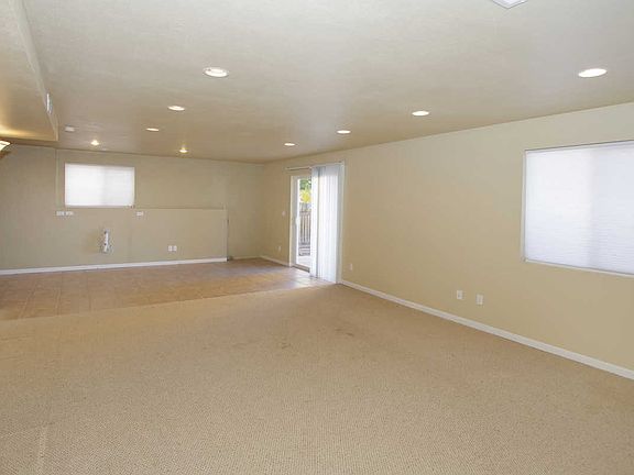 Basement family room/ rec room with rough-in plumbing for a wet bar