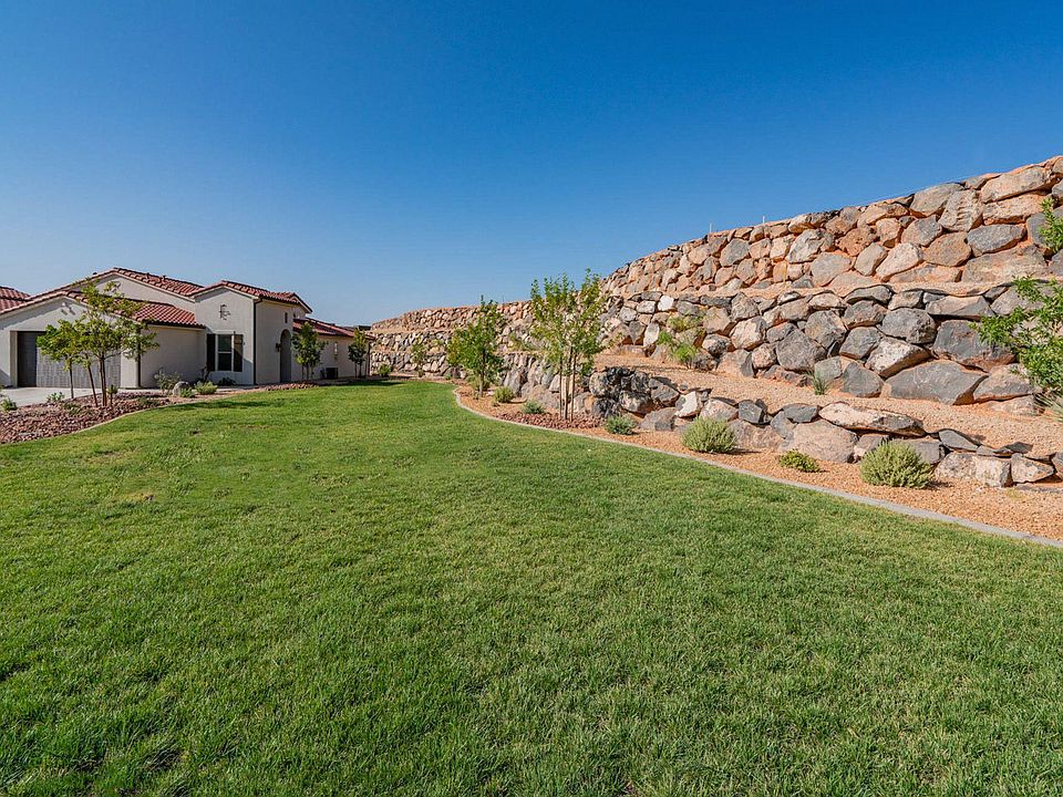 Adjacent lawn is cared for by the HOA, all the benefits of having a lawn with no yard care responsibilities!