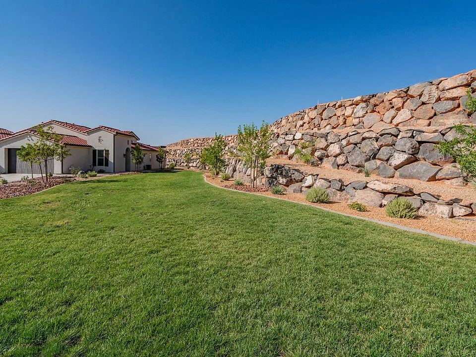 Adjacent lawn is cared for by the HOA, all the benefits of having a lawn with no yard care responsibilities!