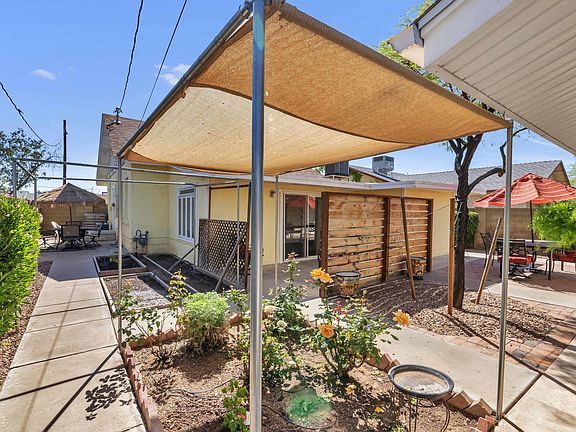 View out of the front door, rose garden.
