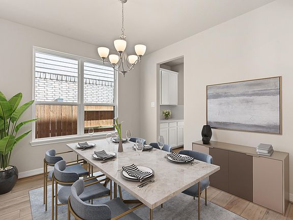 The dining room is a perfect blend of style and functionality and provides an inviting space for mem
