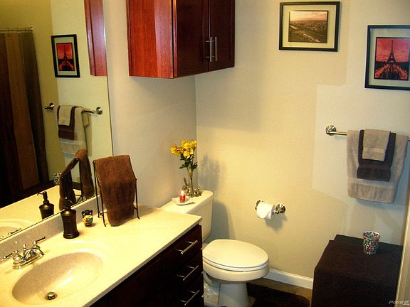 Bathroom w/Tile & Solid Surface Counters