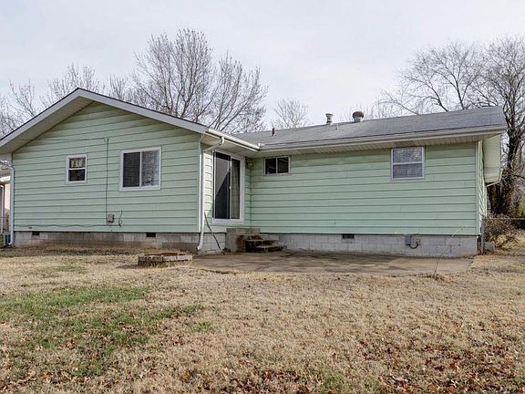 Back patio and fenced back yard