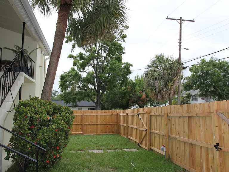 Another Picture Of The Private Backyard Area. The Parking Spaces Are Behind The Fence Through One Of The Two Entry/Exit Gates.