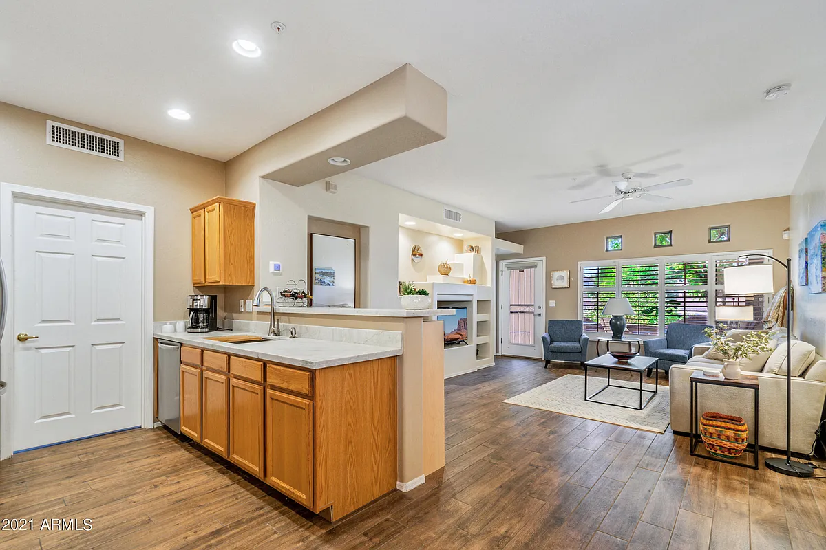 Building Photo - 9100 E Raintree Dr #102
