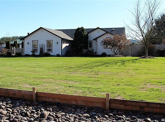 Immaculate rambler on large lot in country setting.  Perfect for gardening and play.