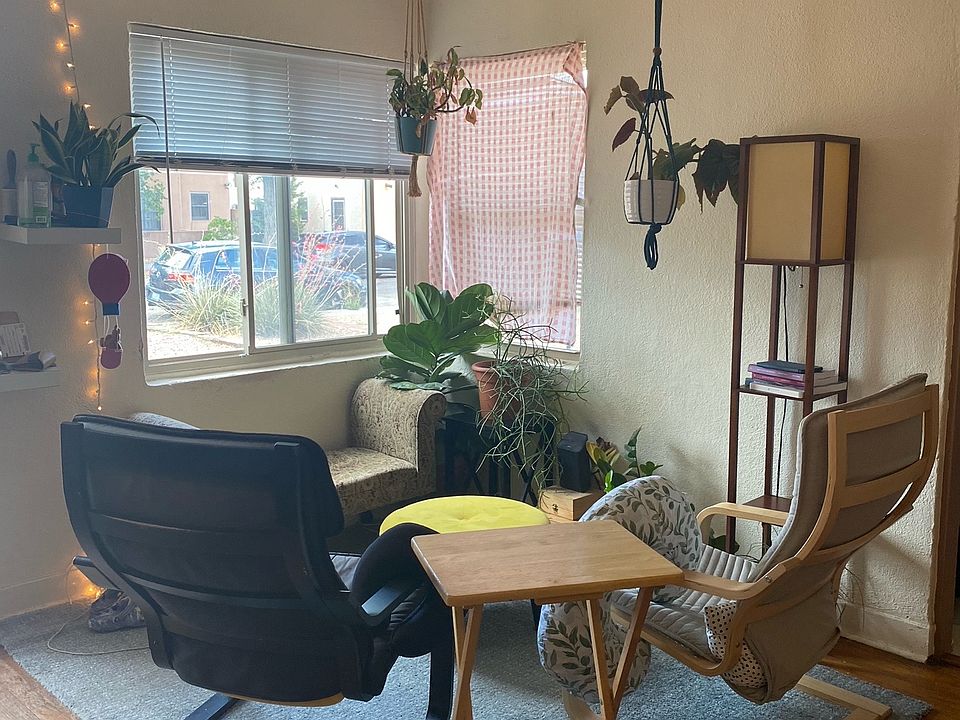 Part of the living room by the front door
