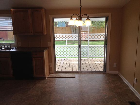 Entry through Sliding Doors to Back Porch
