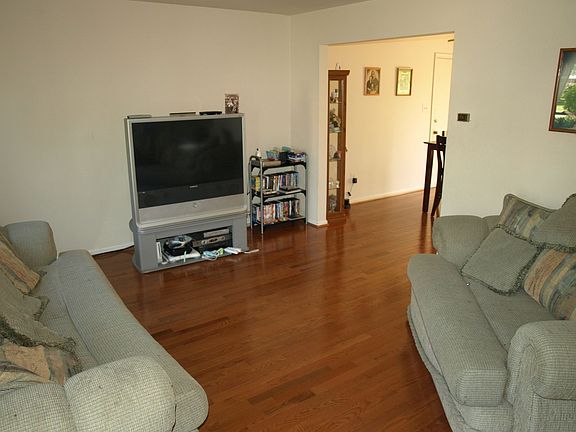 Gleaming hardwoods in living room