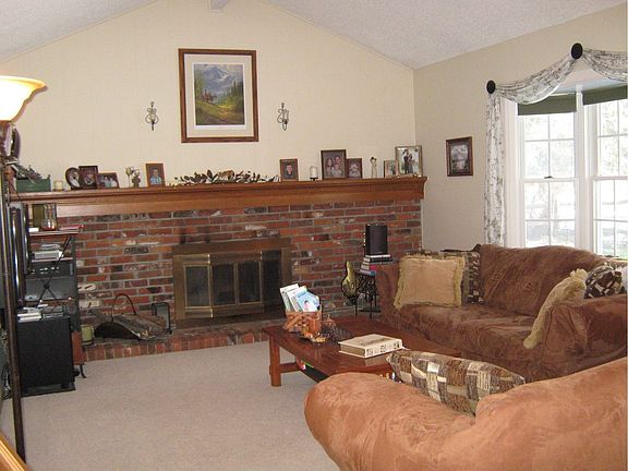 Family Rm w/Vaulted Ceiling & Wood Burning Fireplace