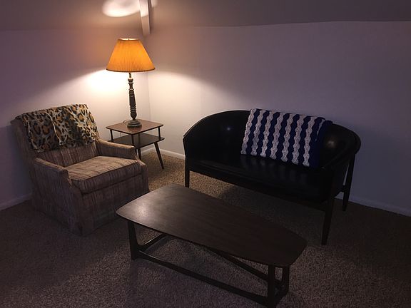 sitting area with cable hookup and additional storage to the