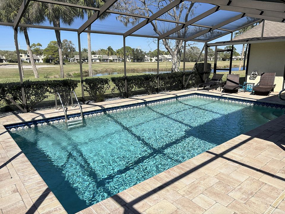 beautiful pool, screened cage, large area for dining and play
