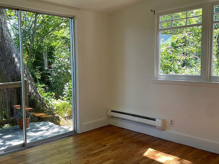 Second bedroom with sliding door to the deck.