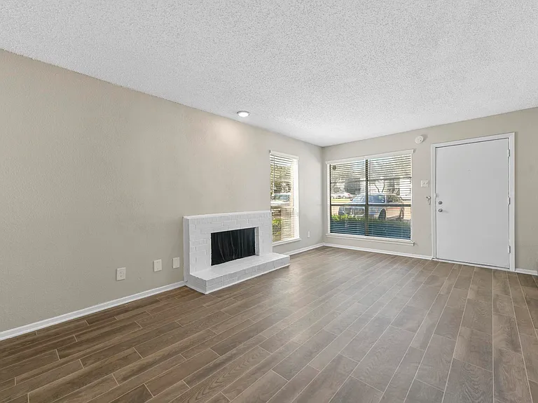 Spacious open floor plan with access to kitchen and fireplace