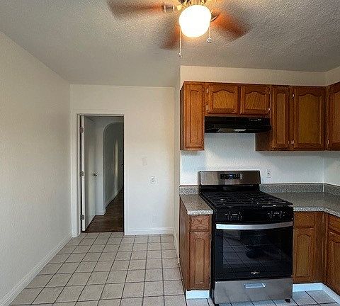 Kitchenette & hallway to bedroom