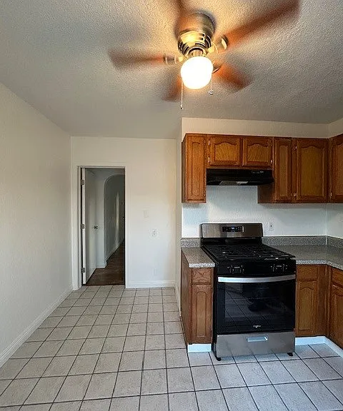 Kitchenette & hallway to bedroom