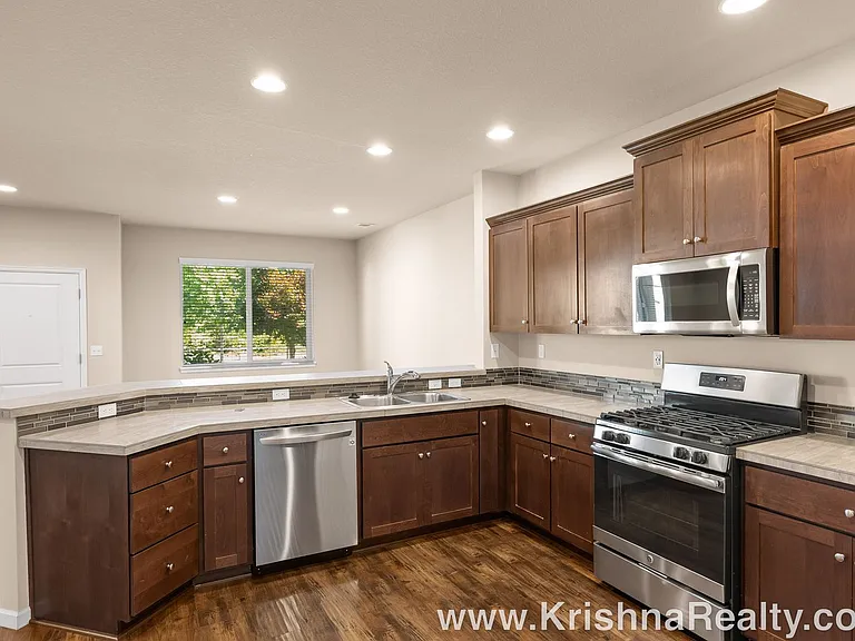7188 NW Abigail Ter — Photo 10