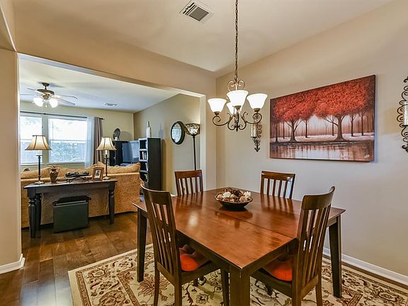 12x9 Dining Room - A view from the Dining Room to the Living Room. Engineered wood flooring in both rooms.