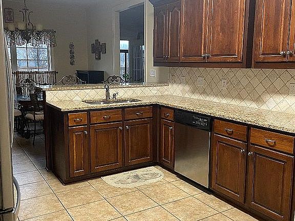 Kitchen dishwasher view.